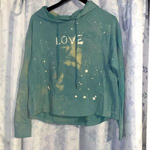 Green women’s sweatshirt